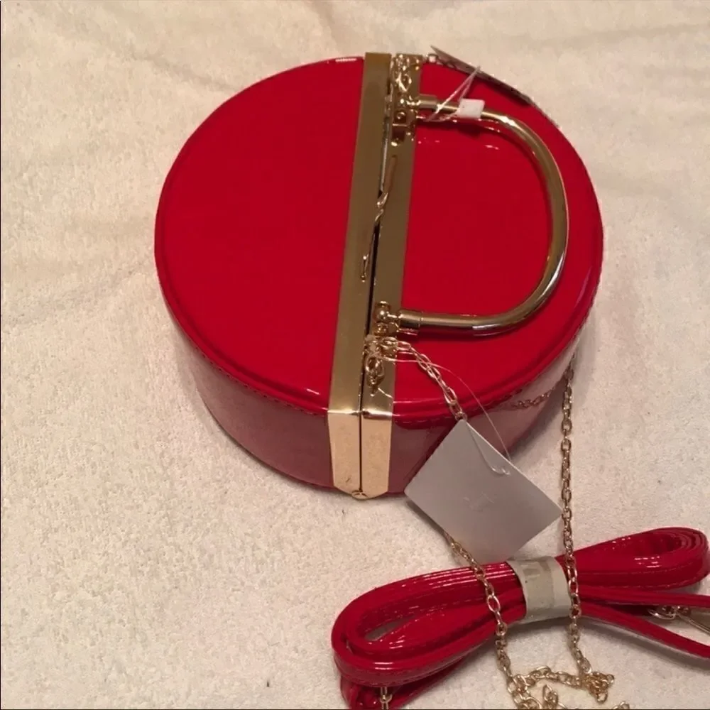 Red and Gold Patent convertible bag​​​​​​​​​​​​​​​​​​​​​​​ - Picture 2 of 6